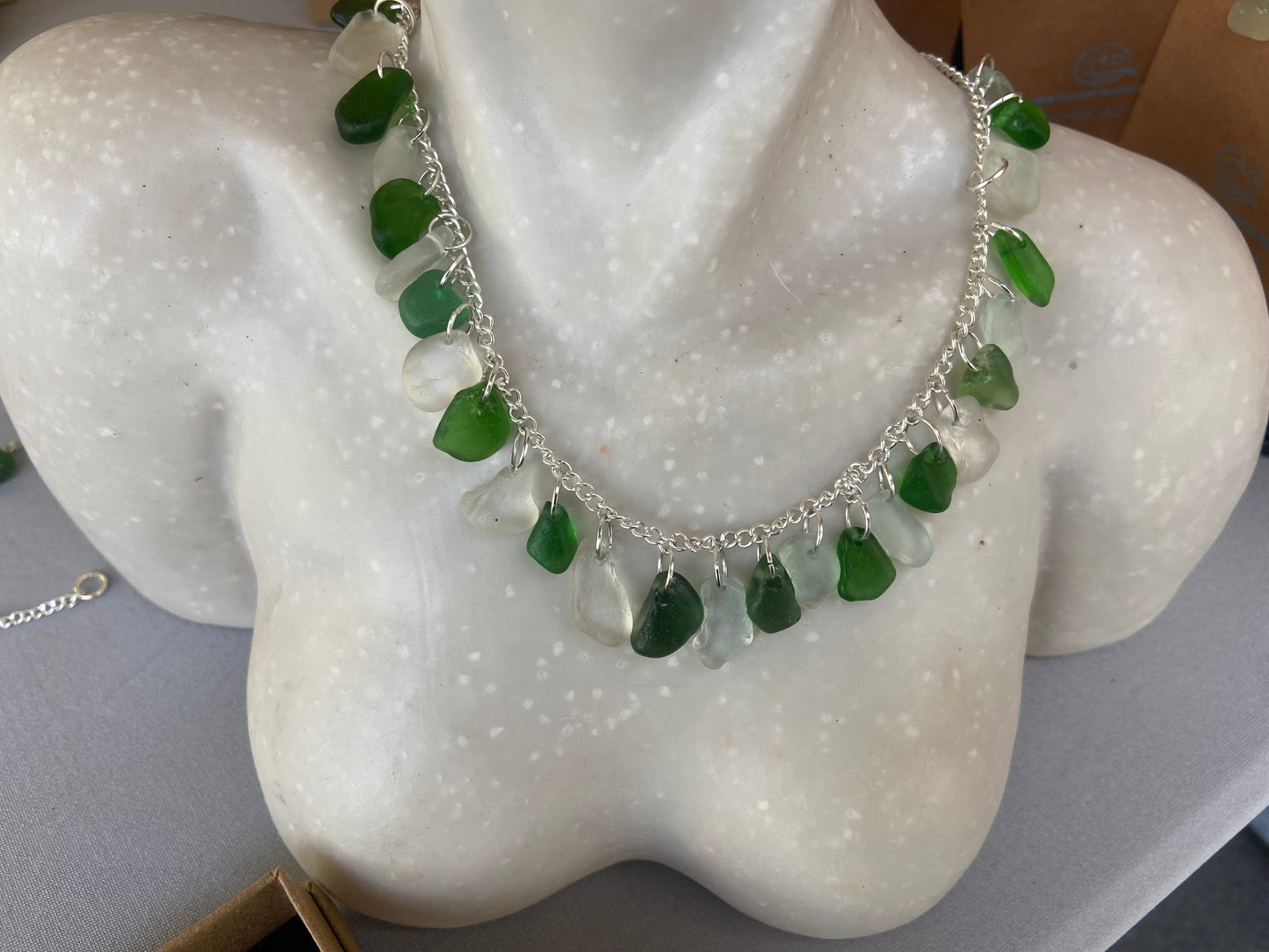 Multi piece white / green sea glass silver plated necklace
